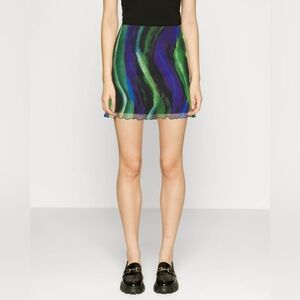 NOISY MAY. Mesh short sleeve top / with a mesh striped skirt with black lining.